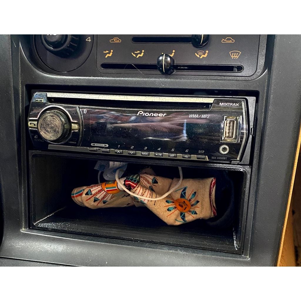 Under Radio Cubby for 1990 Mazda Miata